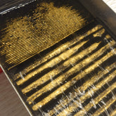 Goldwaschrinne voller Goldflitter